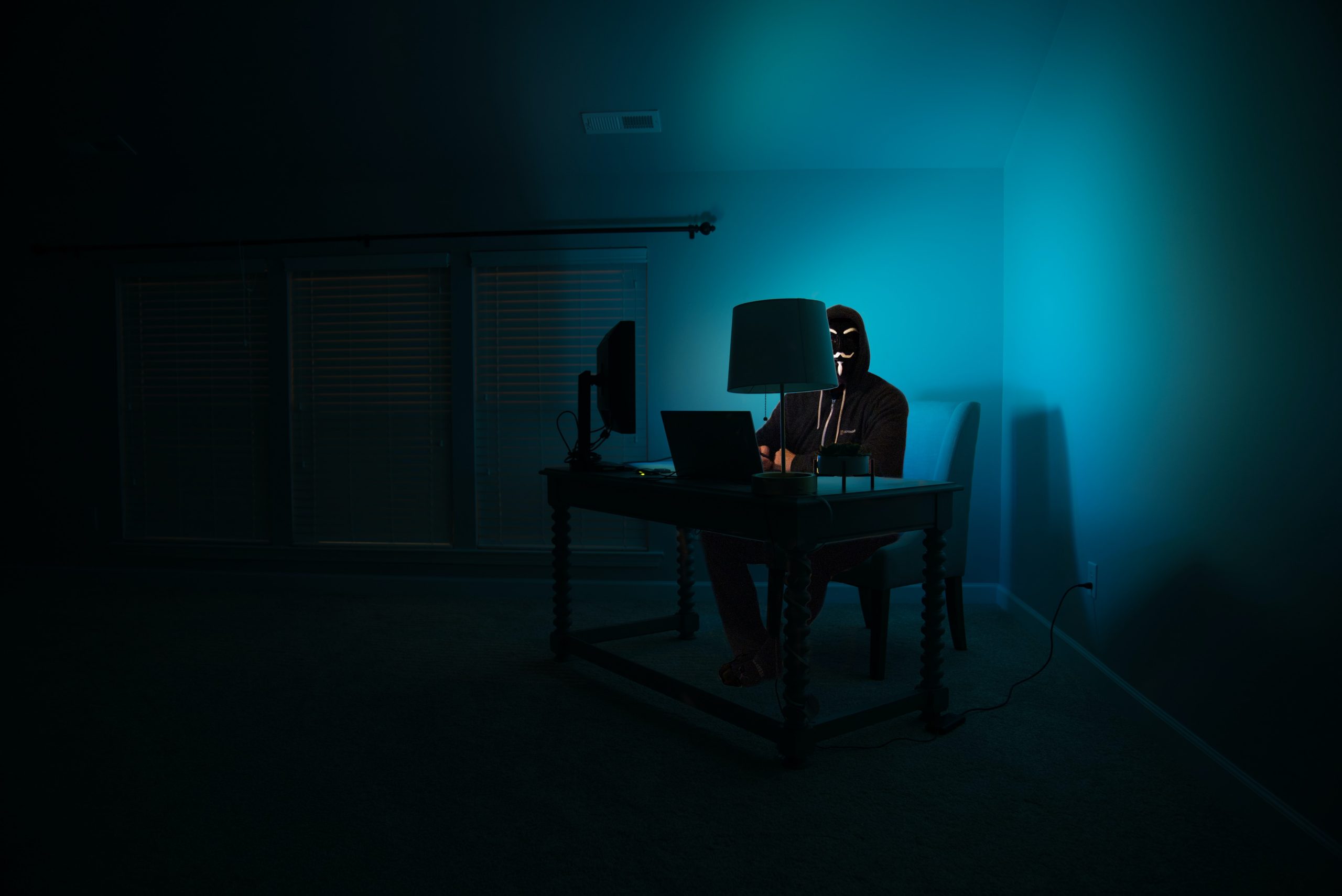 Image of an anonymous content marketer at a laptop